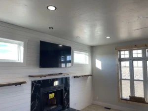 225 Iron Horse Rd family room showing TV and fireplace