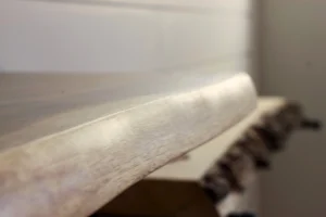 Family room natural wood shelving