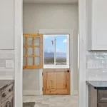 Kitchen to sunroom at 225 Iron Horse Rd